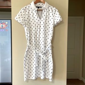 Tommy Hilfiger dress with its belt size L. Polo neck.